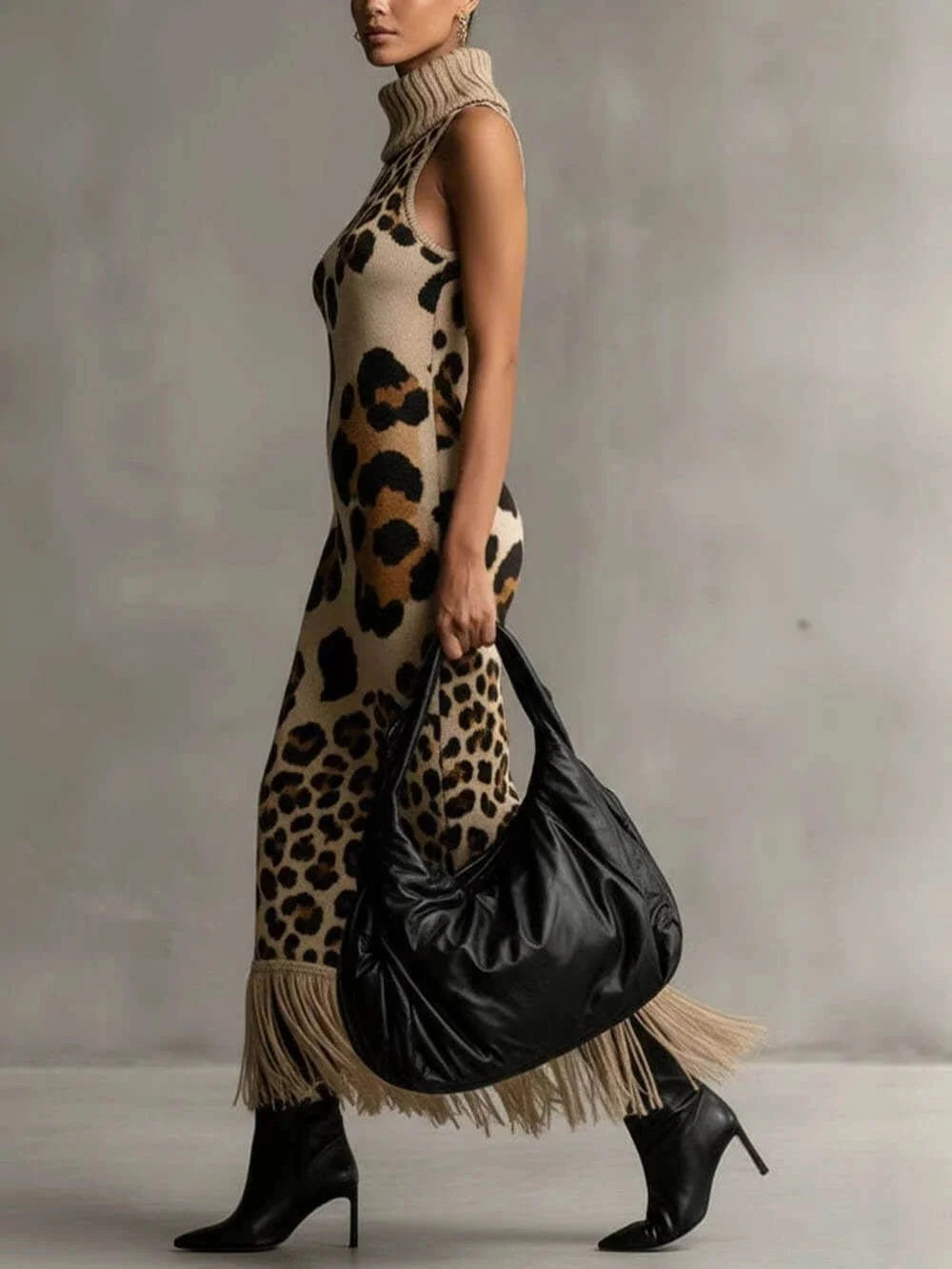 Vestido largo de punto con leopardo y flecos