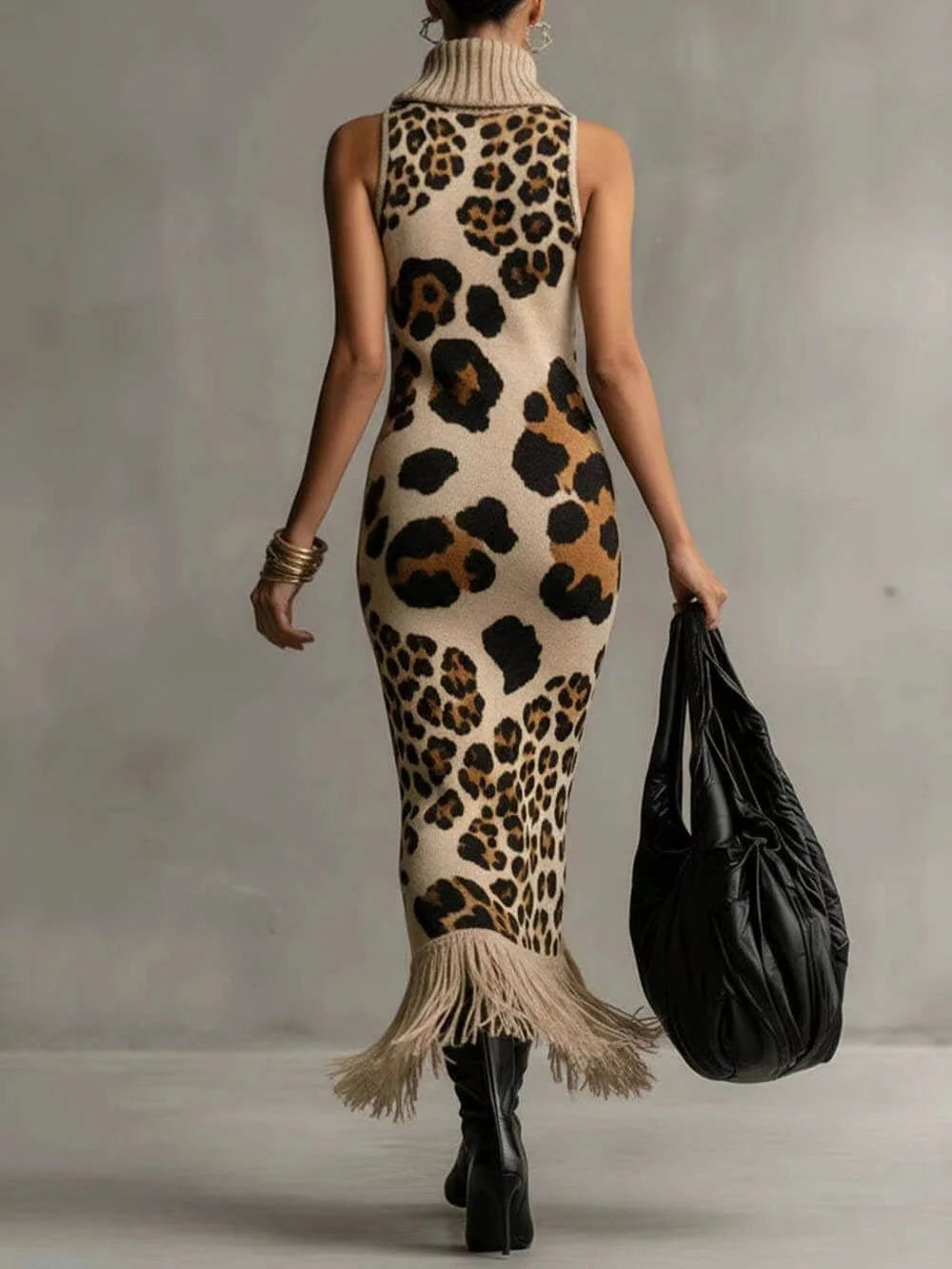 Vestido largo de punto con leopardo y flecos