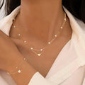 Set corazón y perlas superpuestas Margaux