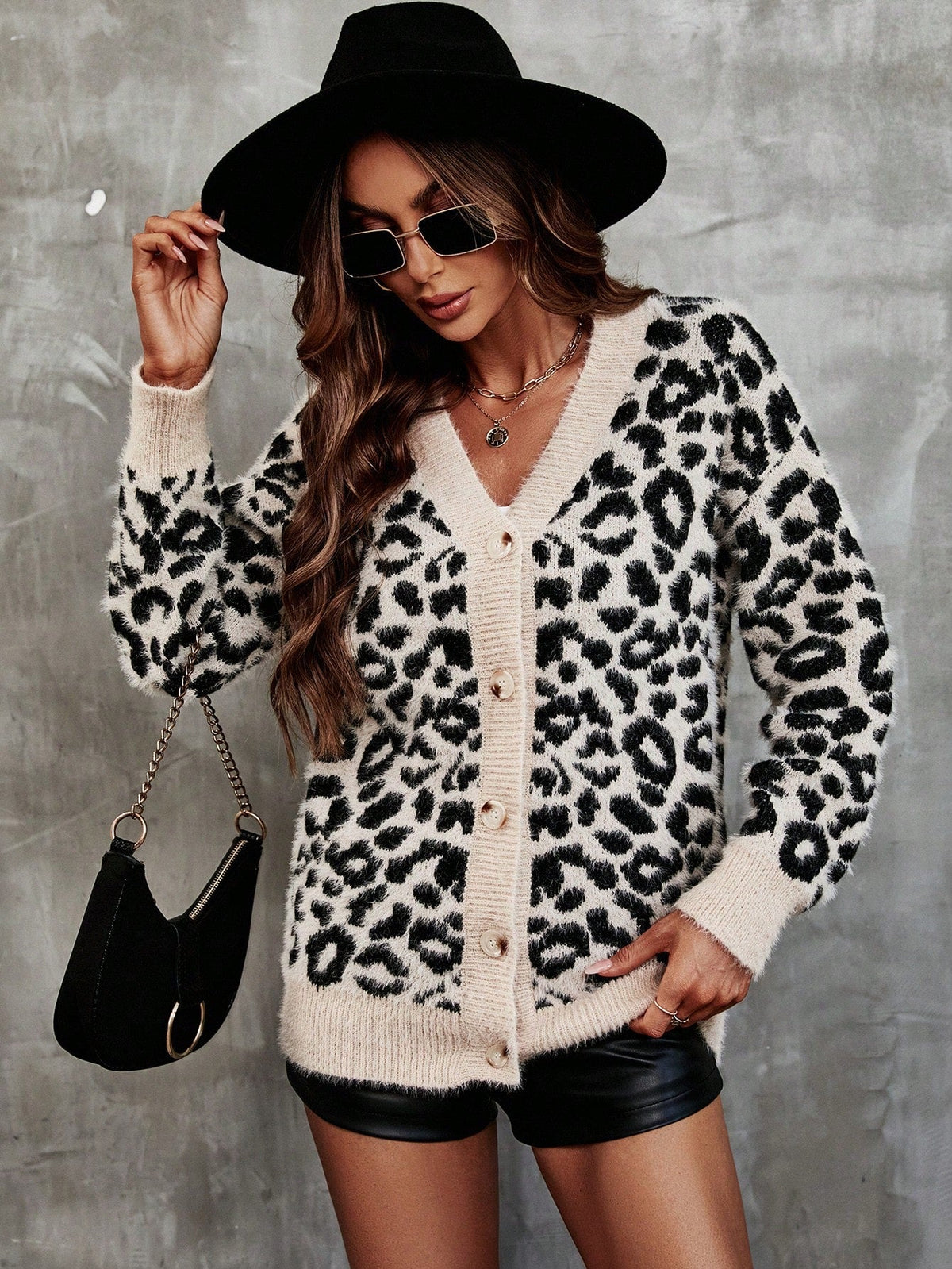 Cárdigan de leopardo con hombro caído