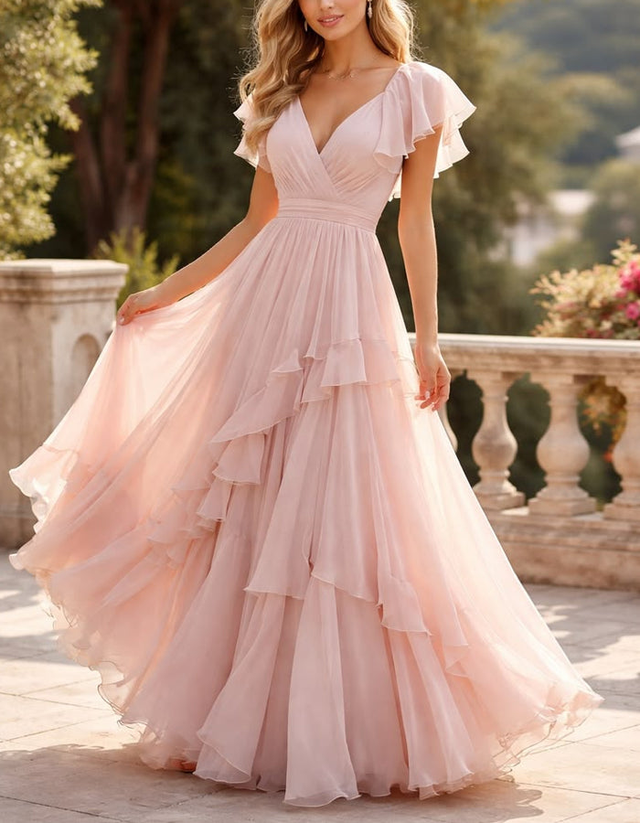 Vestido largo rosa de chifón con volantes