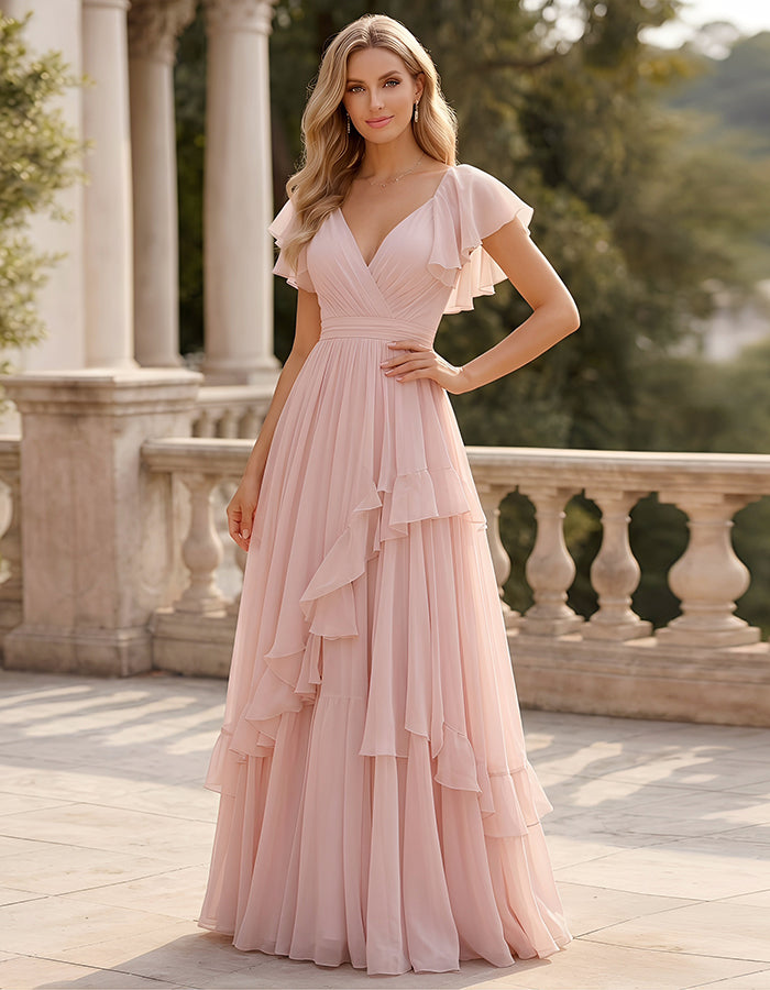 Vestido largo rosa de chifón con volantes