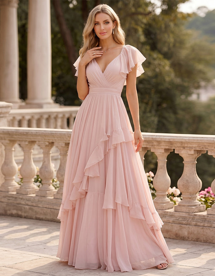 Vestido largo rosa de chifón con volantes