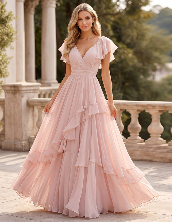 Vestido largo rosa de chifón con volantes