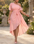 Vestido largo rosa con volantes asimétricos