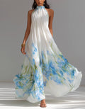 Vestido largo de gasa blanca con estampado floral azul