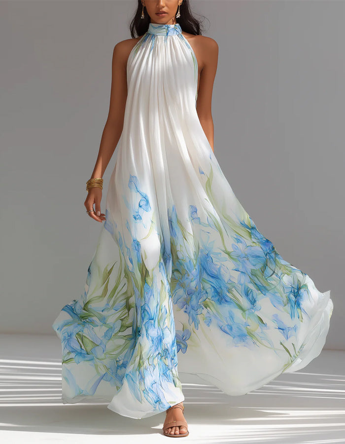Vestido largo de gasa blanca con estampado floral azul