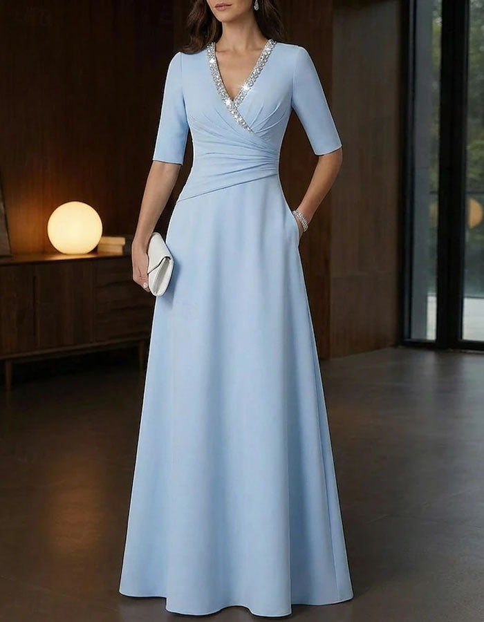 Vestido largo con cuello en v y lentejuelas