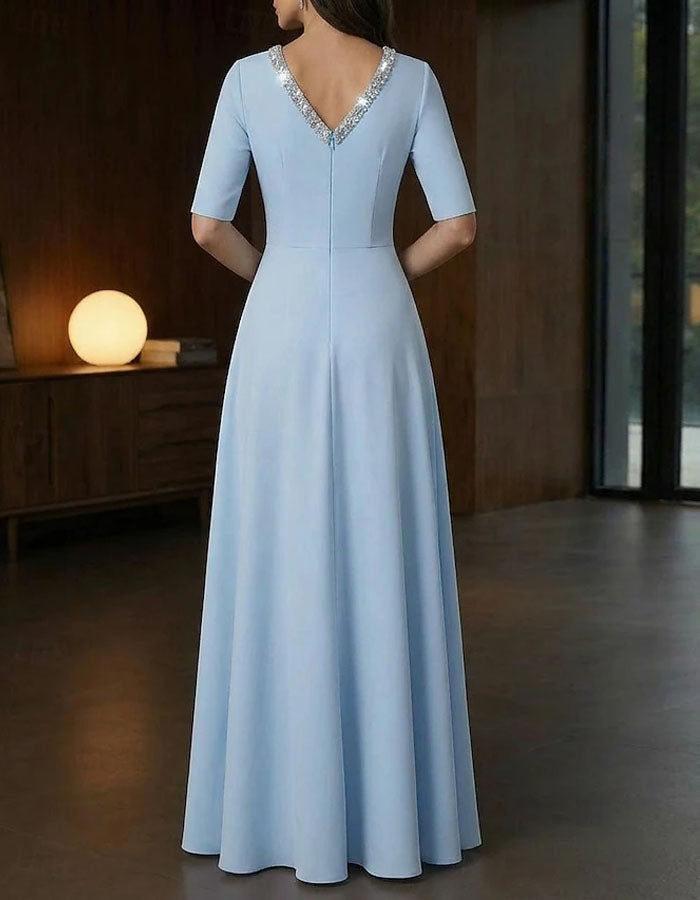 Vestido largo con cuello en v y lentejuelas