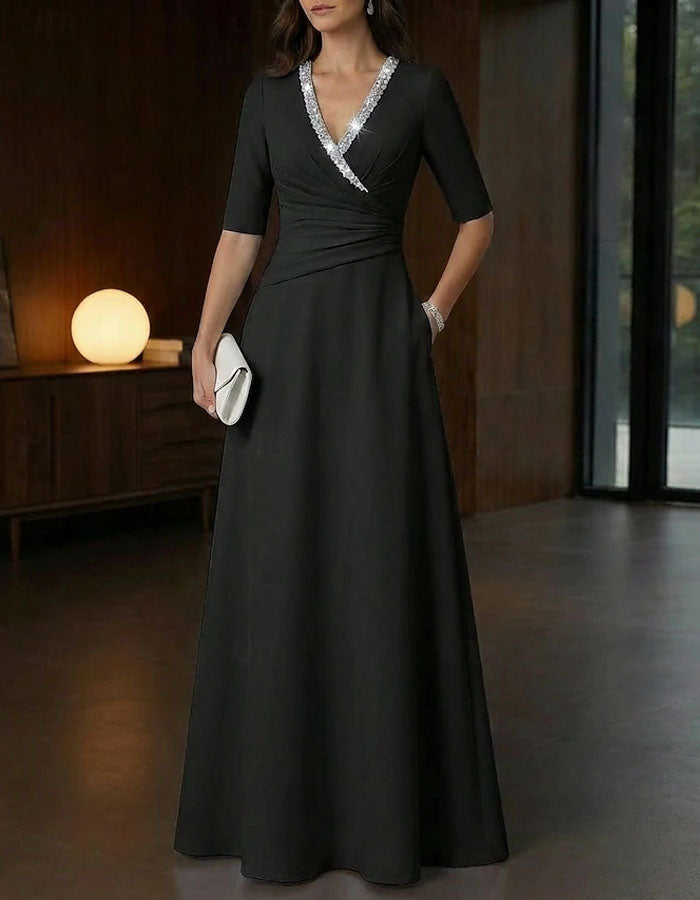Vestido largo con cuello en v y lentejuelas