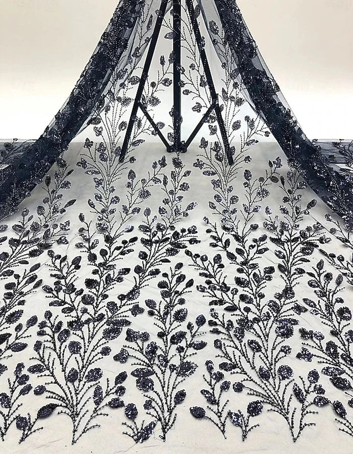 Vestido largo asimétrico de satén con lentejuelas