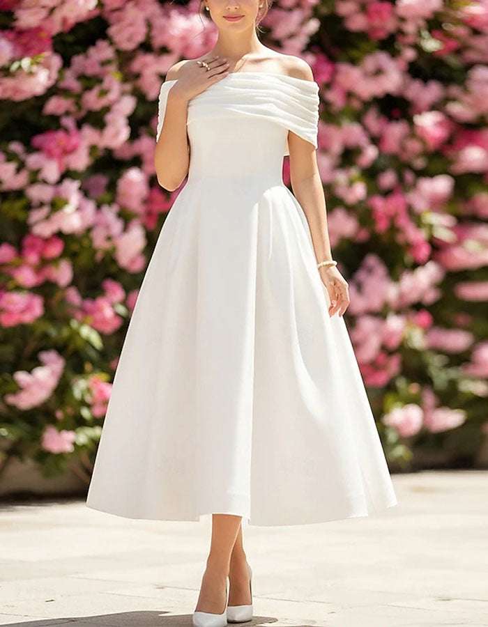 Vestido midi blanco de hombros descubiertos