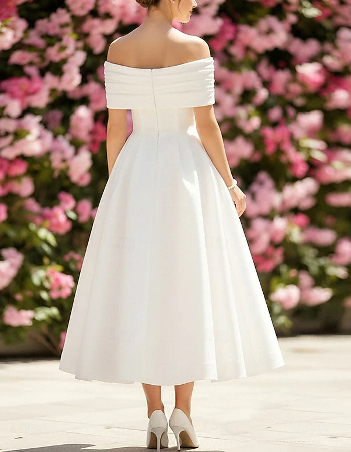 Vestido midi blanco de hombros descubiertos