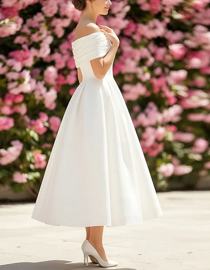 Vestido midi blanco de hombros descubiertos