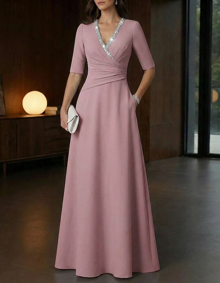 Vestido largo con cuello en v y lentejuelas