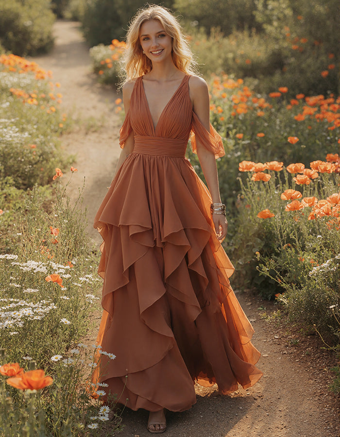 Vestido largo terracota con escote pico y mangas de volantes