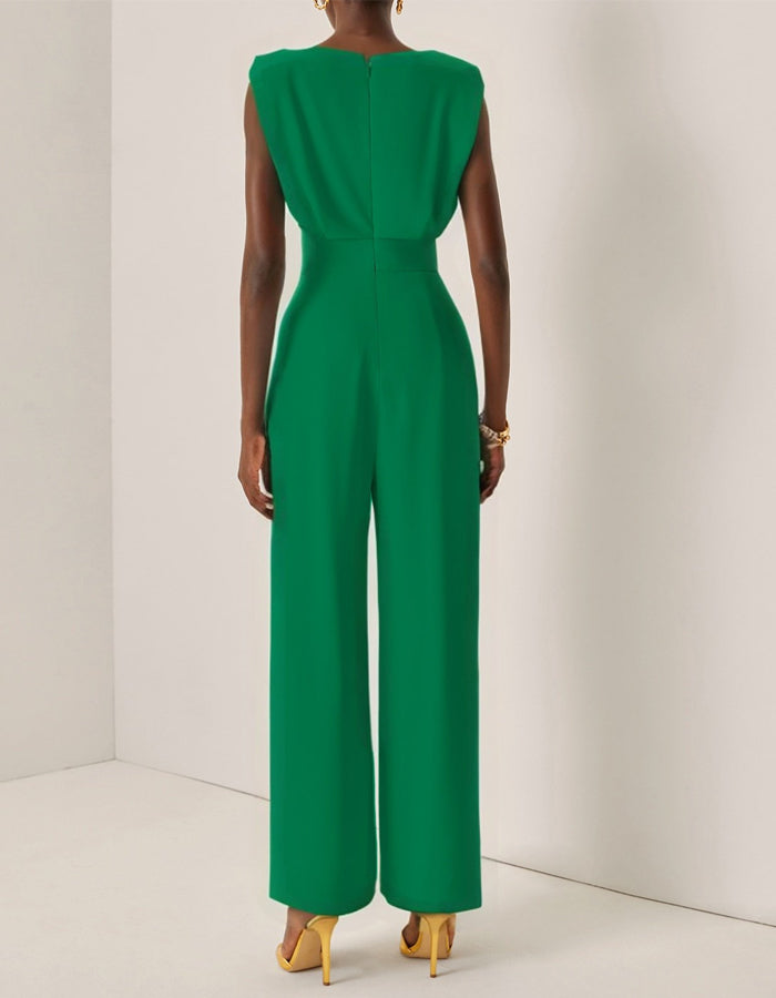 Mono verde con cuello redondo y hombreras acolchadas