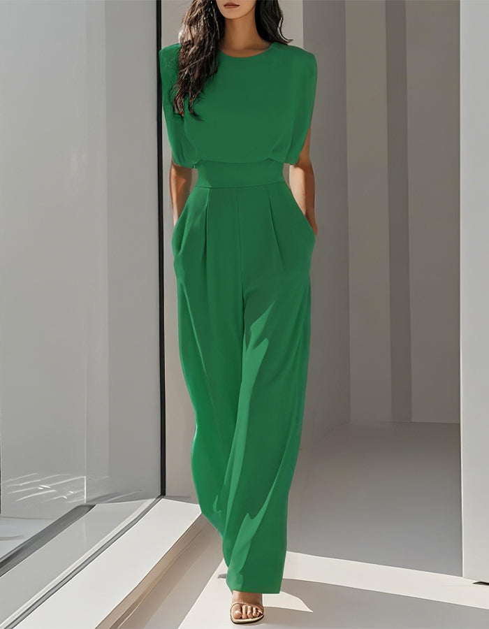 Mono verde con cuello redondo y hombreras acolchadas