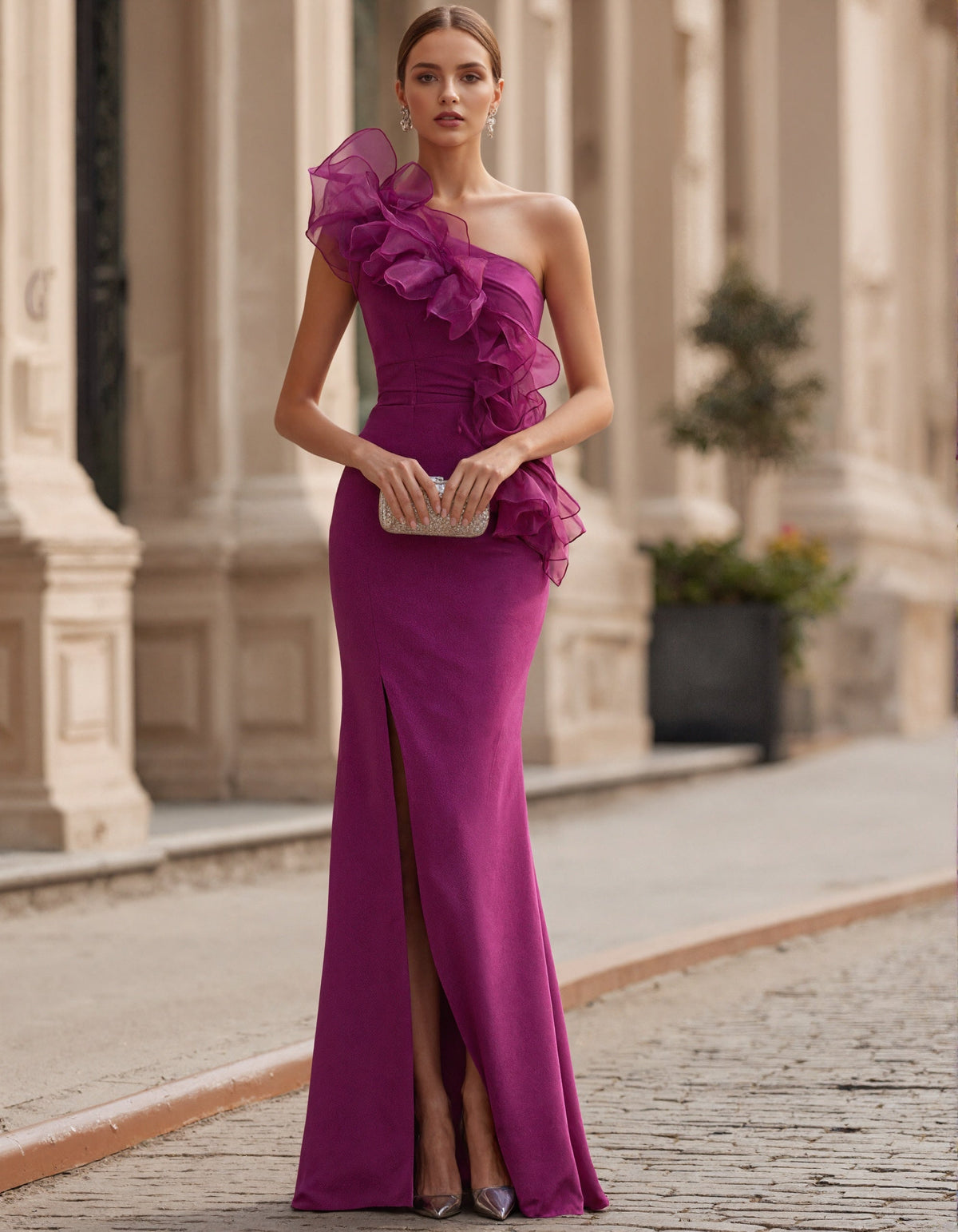 Vestido largo rosa fucsia asimétrico con volantes