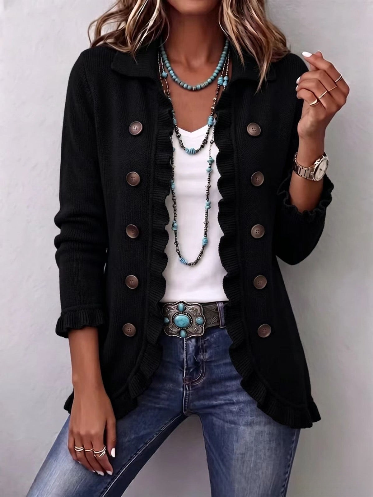 Chaqueta de punto con volantes negra
