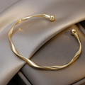 Brazalete dorado pulido Agathe